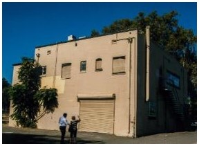 Before: view of firehouse rear before construction